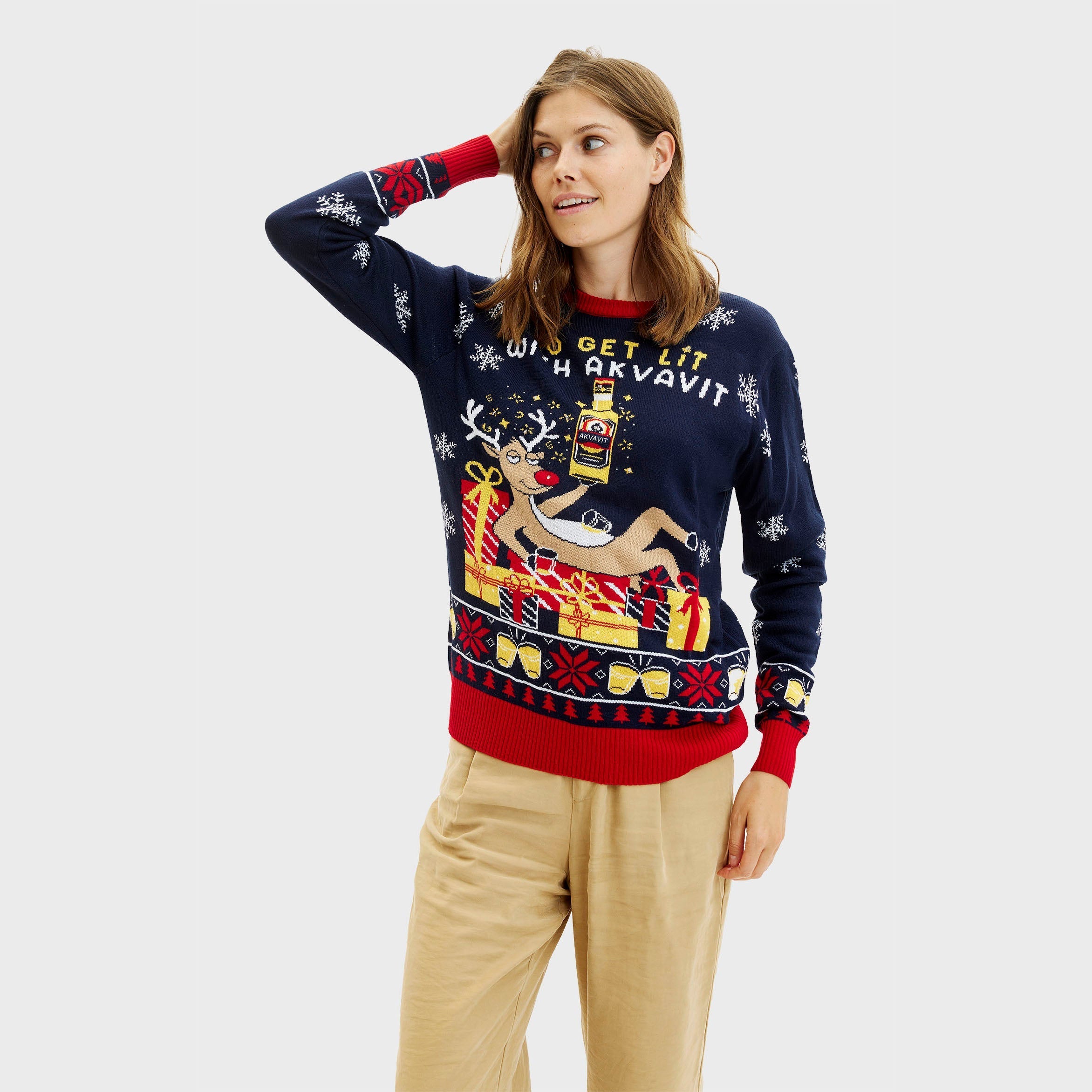 Damen Weihnachtspullover in Dunkelblau mit roten Bündchen, weihnachtlichem Rentier- und Schriftzug-Design, Acrylmaterial,.